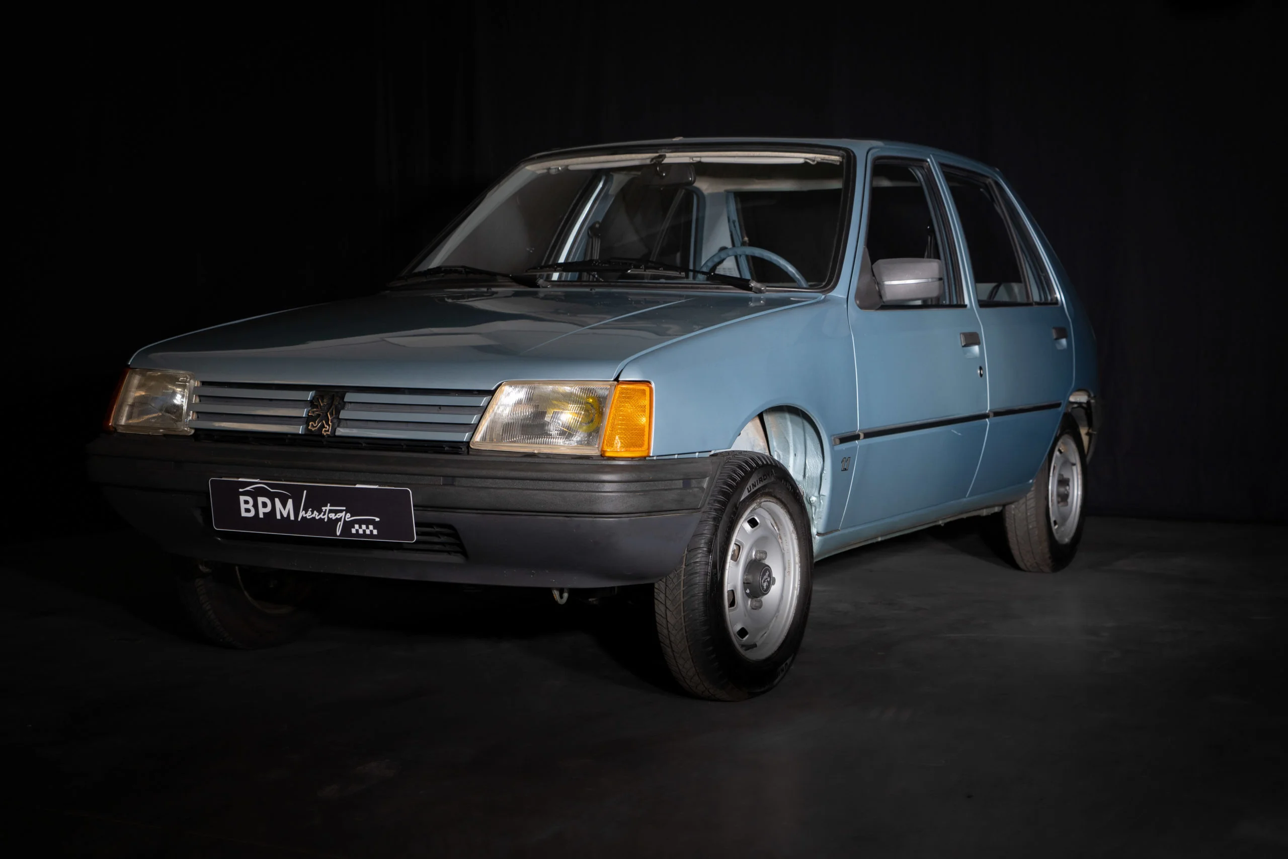 Cars - PCX87 - 0506 - 1984 Peugeot 205 in Metallic Light Blue high quality  plastic</i> Photo is pre-production sample, final product may vary</i>
